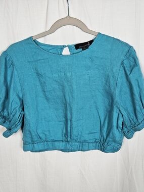 Cropped Teal Puff Sleeve Top 100% Linen. Fits more like a small.